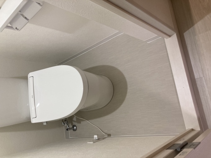施工後｜LIXIL棚付2連紙巻器とタオルリングを設置
